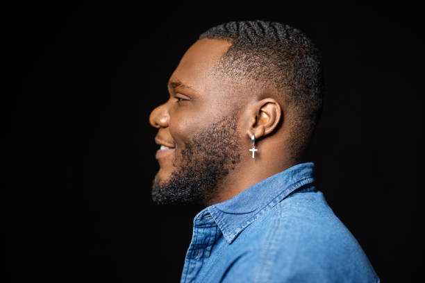 istock Profile view of stylish african man 1299840743