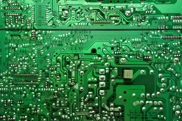 Macro shot of the back side of a circuit board Macro shot of the back side of a circuit board. Concept background. circuit board stock pictures, royalty-free photos & images