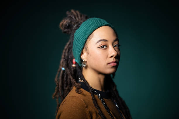 istock Studio portrait of young woman with blank expression 1299841047