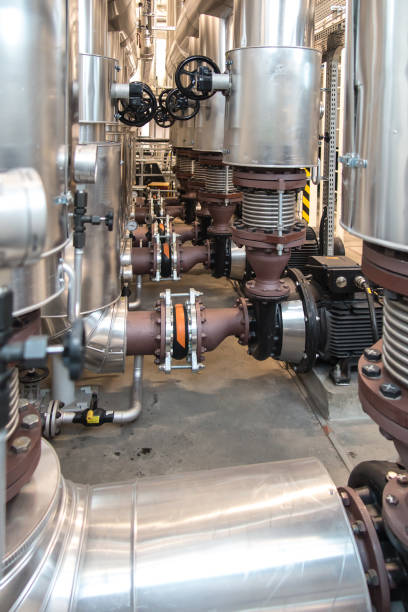 istock several water pumps and thermally insulated pipes 1299842592