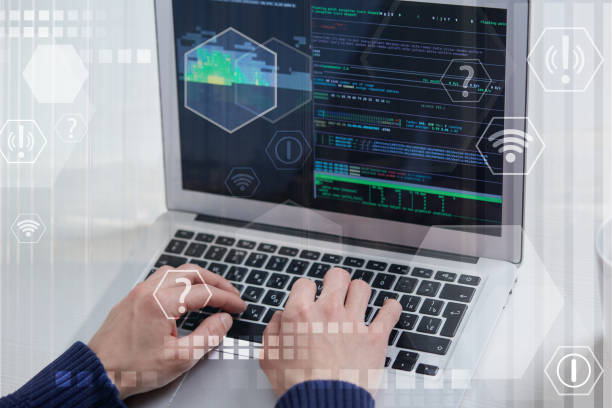 istock Hands of a man typing on the keyboard, the work of a programmer. 1299843273