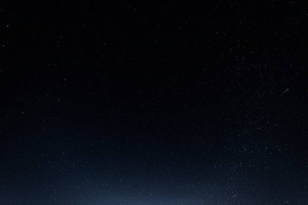 istock A starry sky with many stars and a flying meteor 1299843743