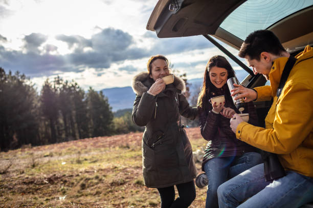 istock Friends having a break from hiking 1299847844
