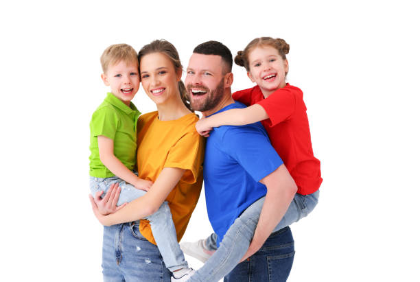 istock Cheerful family looking at camera in studio 1299849697
