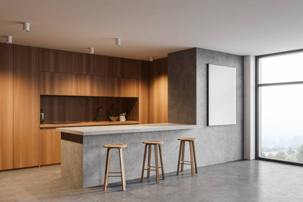 istock Concrete and wooden kitchen corner with bar and poster 1299850905