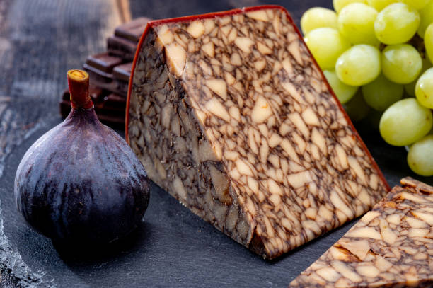 istock Cheese collection, Irish brown waxed marbeled cheddar cheese flavoured with Guinness dark stout beer 1299851739