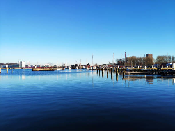 istock Sail boats in a quiet Marina on sunny winter day 1299851829