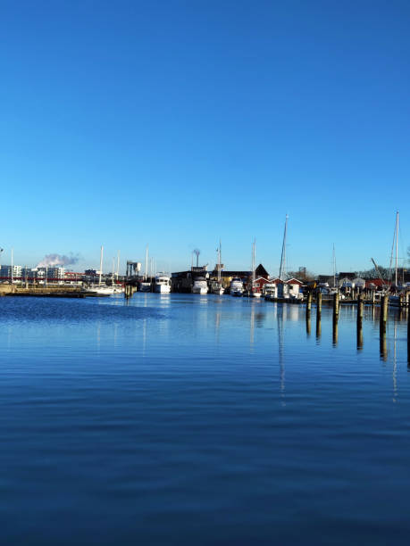 istock Sail boats in a quiet Marina on sunny winter day 1299851947