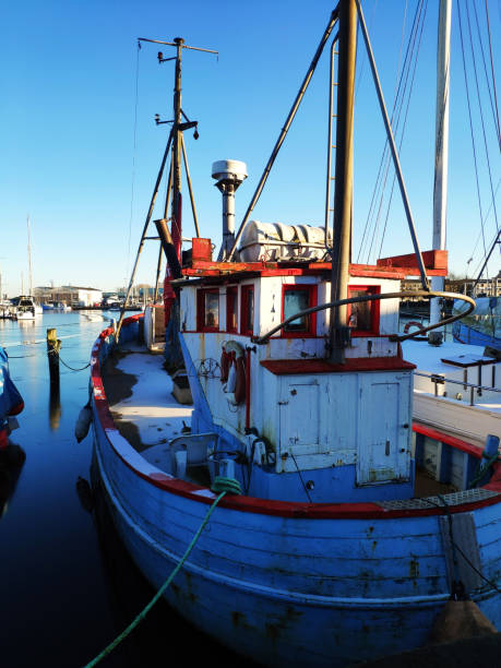 istock Sail boats in a quiet Marina on sunny winter day 1299851984