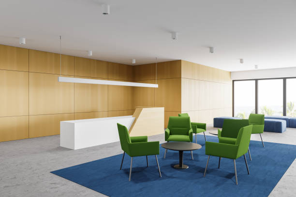 istock Wooden office waiting room corner with reception 1299852727