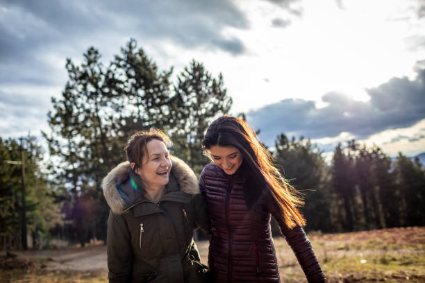 istock Two women relaxing in nature 1299852751
