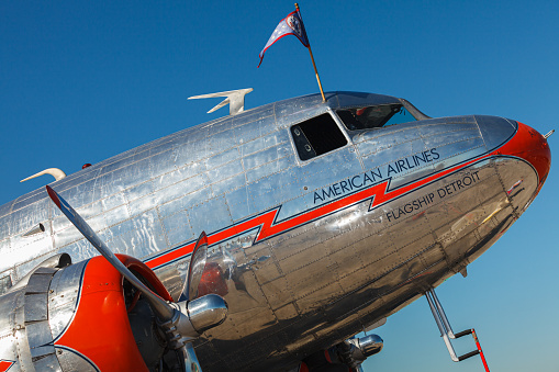 Homestead, Florida USA - November 3, 2012: Close up view of a vintage American Airlines propeller passenger and cargo airplane on display at a public airshow in Homestead Airforce base.