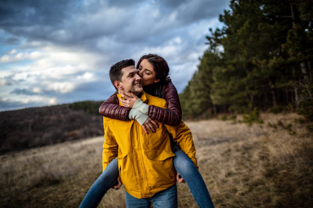 istock Young couple have a fun on their autumn adventure 1299852983