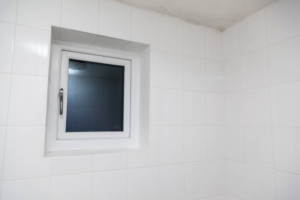 istock small bathroom renovation and installation tiles after grouting 1299856716