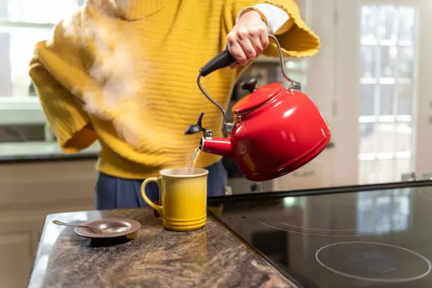 Photo of Woman preparing a tea