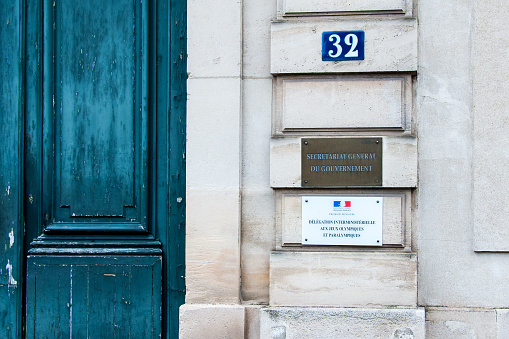 Wall plate in Matignon on the delegation of the Olympic Games in preparation in Paris. France. January 31, 2021.