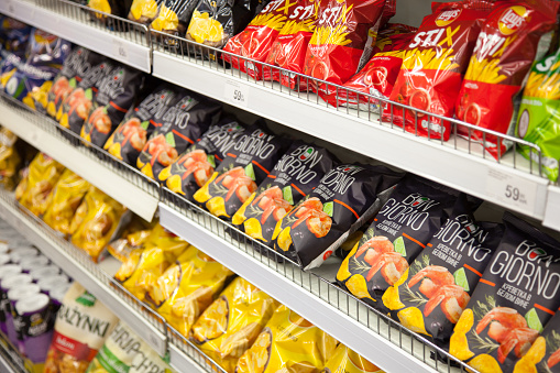 Kaliningrad, Russia - January 31, 2021: Chips on supermarket shelves.