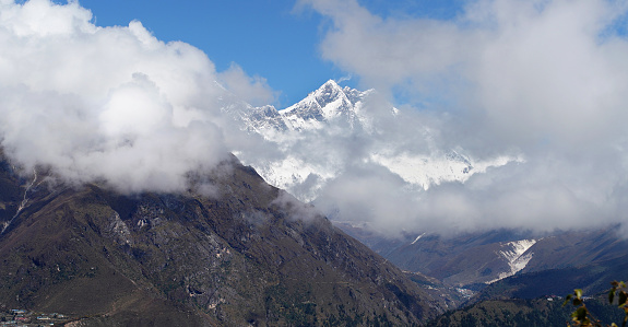 Lhotse  8516m mountain - is 4th higest peak in the world covered with clouds. Hotel Everest View point. Everest Base Camp trekking route near Namche Bazaar, Nepal.