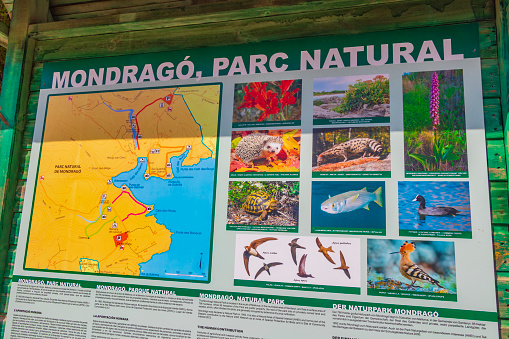 Colorful information board about Parc natural de Mondragó Cala Mondrago Samarador Mallorca.