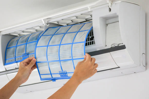 istock man hand hold air conditioner filter cleaning concept 1299866491