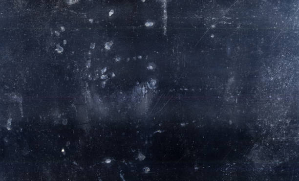 istock dust overlay weathered blackboard dark stained 1299866774