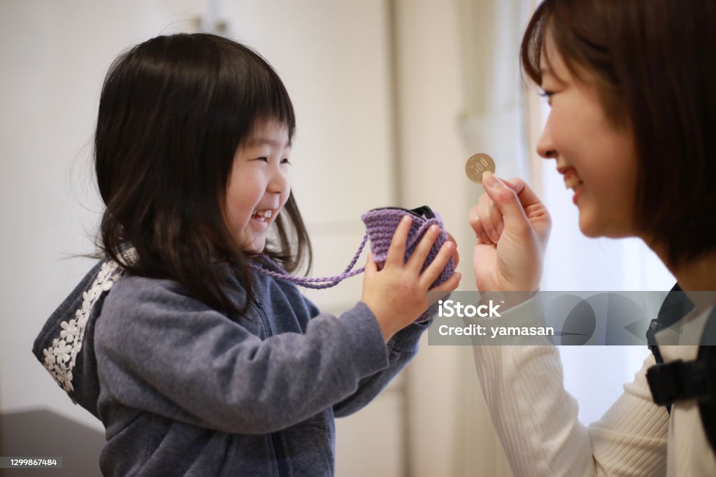 Girl getting pocket money Allowance Stock Photo