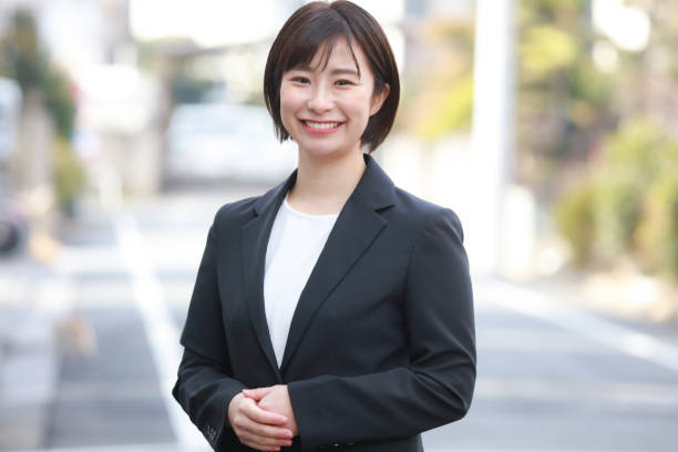 istock Female employee with a smile 1299883669
