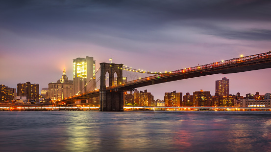 Manhattan city skyline cityscape of New York with Brooklyn Bridge in USA