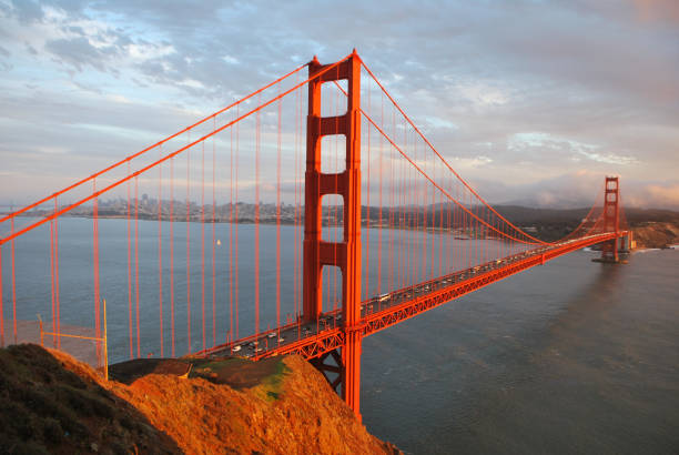 мост золотые ворота - golden gate bridge bridge night sunset стоковые фото и изображения