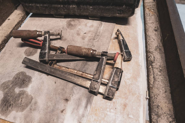 istock in the stonemason's workshop various screw clamps are lying on a table 1299889899