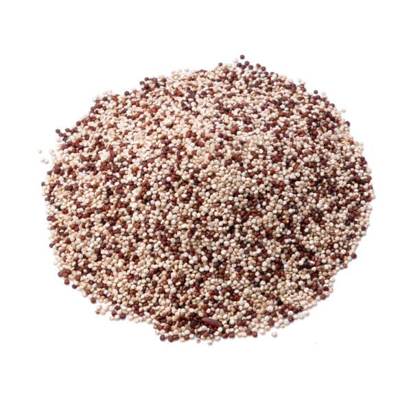 istock Quinoa seeds. White background. Isolated. close-up. View from above. 1299890749
