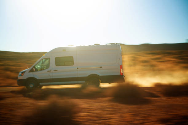istock Commercial van panning motion in the desert - USA 1299890813