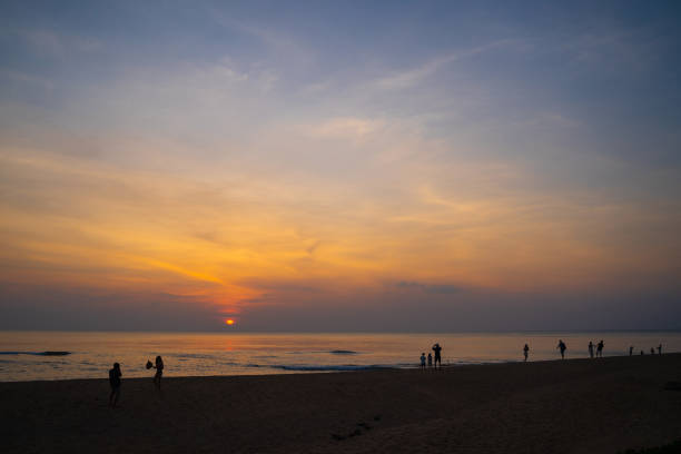istock beautiful sunset at the beach in Thailand 1299892157