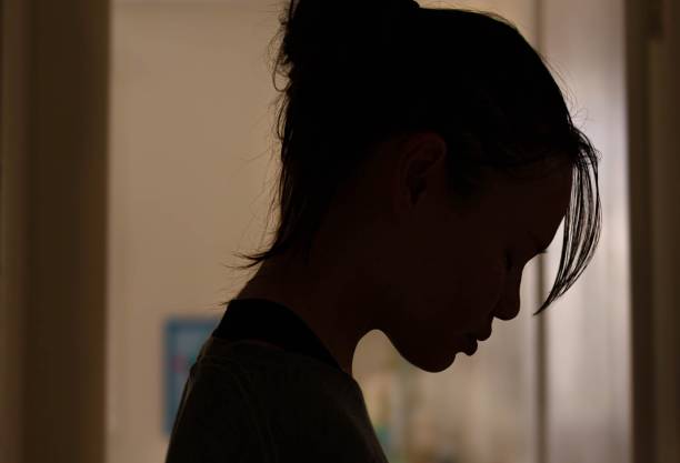 istock Depression. A unhappy stressed woman at home alone. 1299892262