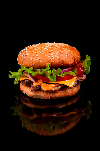 food Sandwich hamburger on black background, no people, vertical,. High quality photo