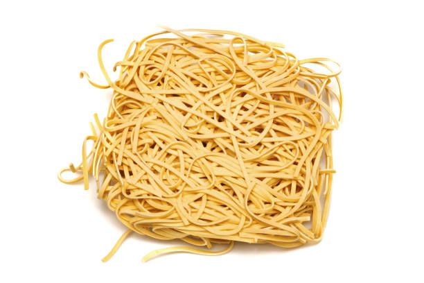 istock Briquette noodle close up, isolate on white background 1299898515