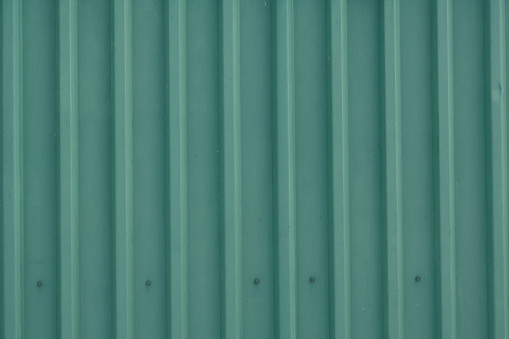 Green corrugated iron wall background