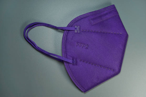 A purple FFP2 protective face mask