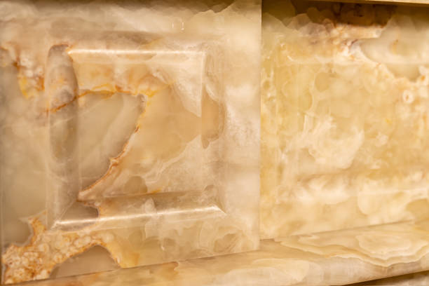 istock Carved patterns on stone luxury fireplace close up 1299900753