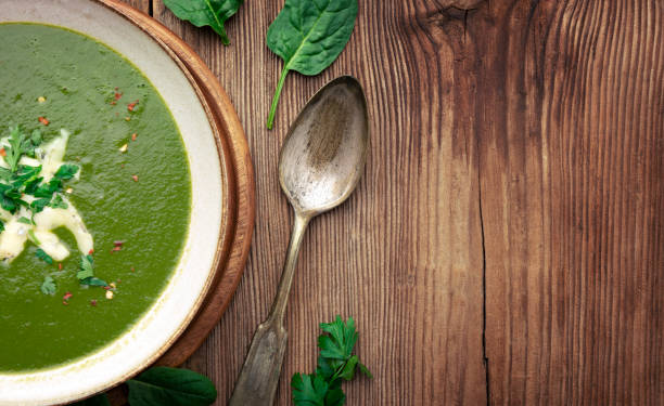 istock Spinach cream soup in a bowl 1299905464