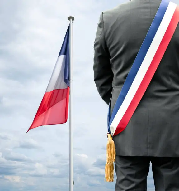 Photo of The French Flag and a Mayor