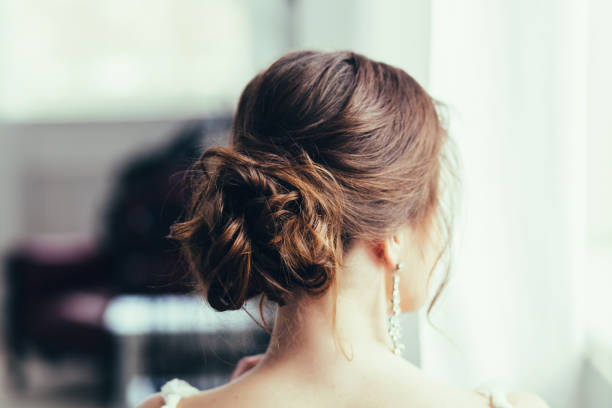 istock bride with wedding makeup and hairstyle. 1299905865