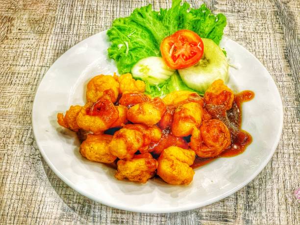 istock Fried squid with butter sauce 1299908451