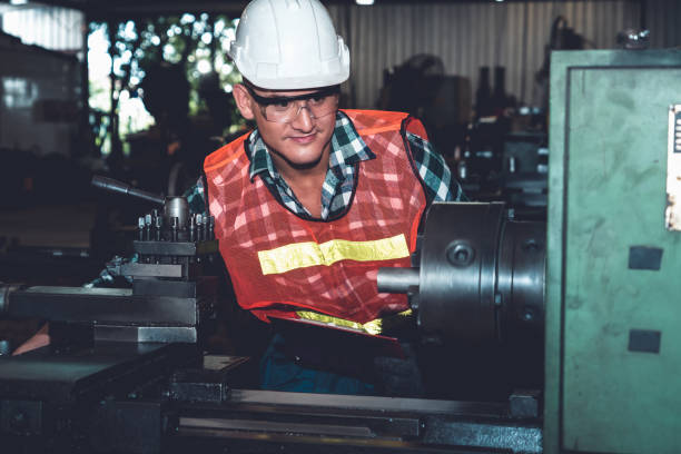 istock Smart factory worker or engineer do machine job in a manufacturing workshop 1299913208