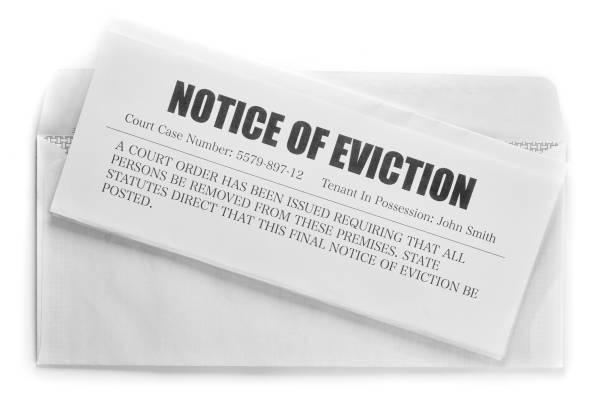 Notice of eviction mail on white background Notice of eviction and envelope on white background eviction photos stock pictures, royalty-free photos & images
