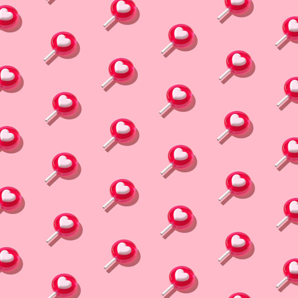 istock Trendy sunlight Summer pattern made with pink lollipop. Valentine's day minimal concept. Flat lay. 3d render 1299918097