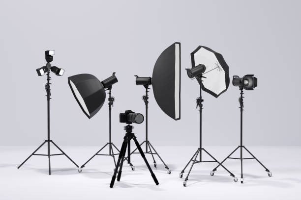 istock Photography studio flash on a lighting stand on white background 1299918432
