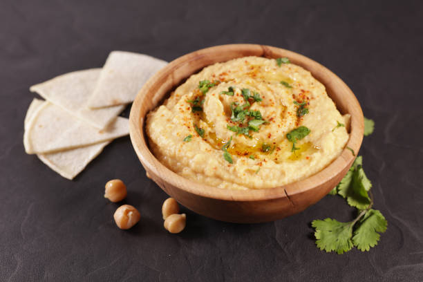 istock bowl of hummus and pita bread 1299921084