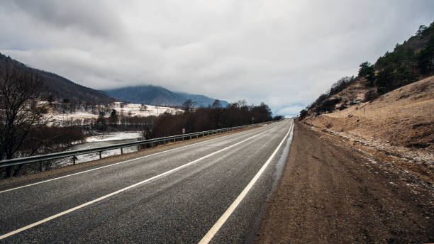 Cloudy morning over the road in the mountains