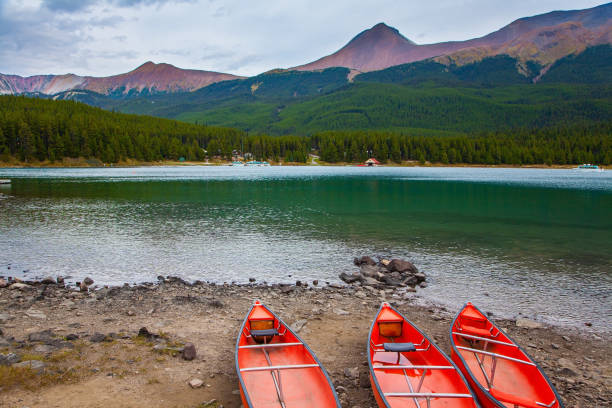 istock Red boats - canoes 1299924167